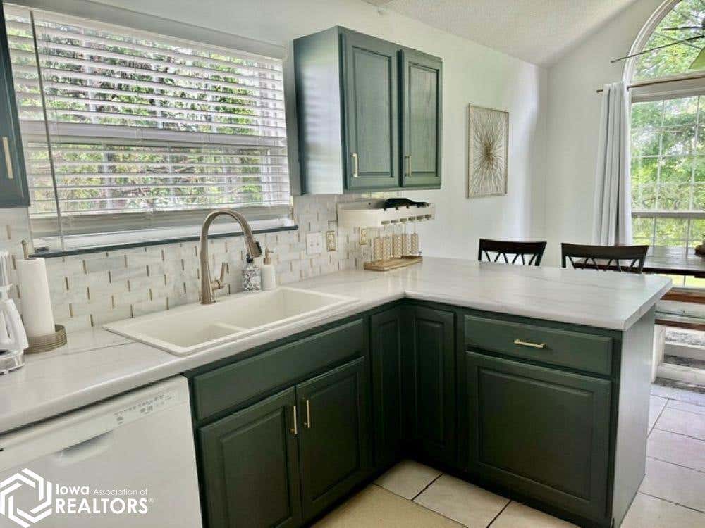 Photo of 1508 D ORCHARD MEADOWS Drive, Burlington, IA 52601 (MLS # 6341513)