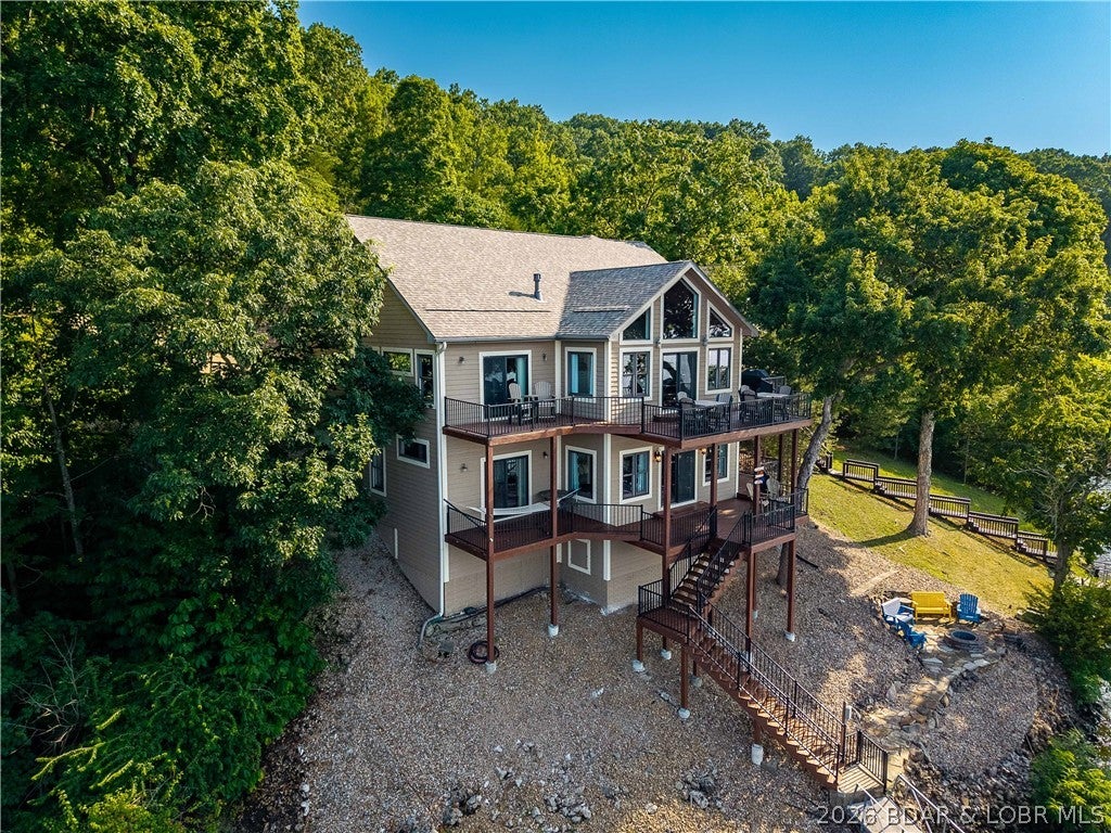 423 Kona Cv, Roach, MO, 65787, USA, 4 Bedrooms Bedrooms, ,5 BathroomsBathrooms,Residential,Active,423 Kona Cv,3589006
