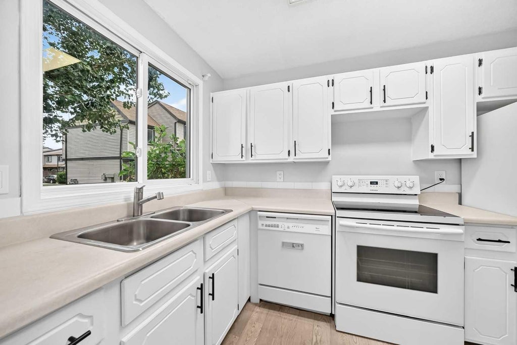 Photo of 3029 Rundleson Road NE #11, Calgary, AB T1Y 3Z5 (MLS # A2341645)