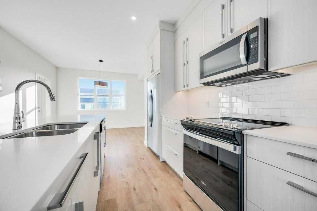 Photo of 293 Dawson Way, Chestermere, AB T1X 2R6 (MLS # A2283648)