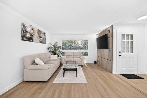 Photo of 135 Woodsman Lane SW, Calgary, AB T2W 4Z5 (MLS # A2339854)