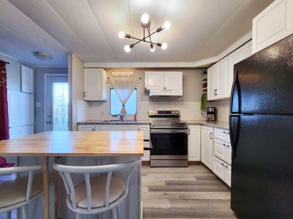 Photo of 34 Willow Road W, Claresholm, AB T0L 0T0 (MLS # A2264887)