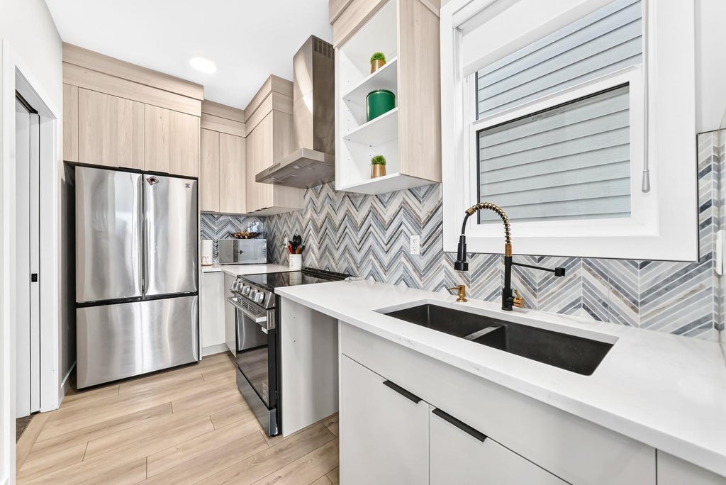 Photo of 183 Marina Grove SE, Calgary, AB T3M 3P4 (MLS # A2341382)
