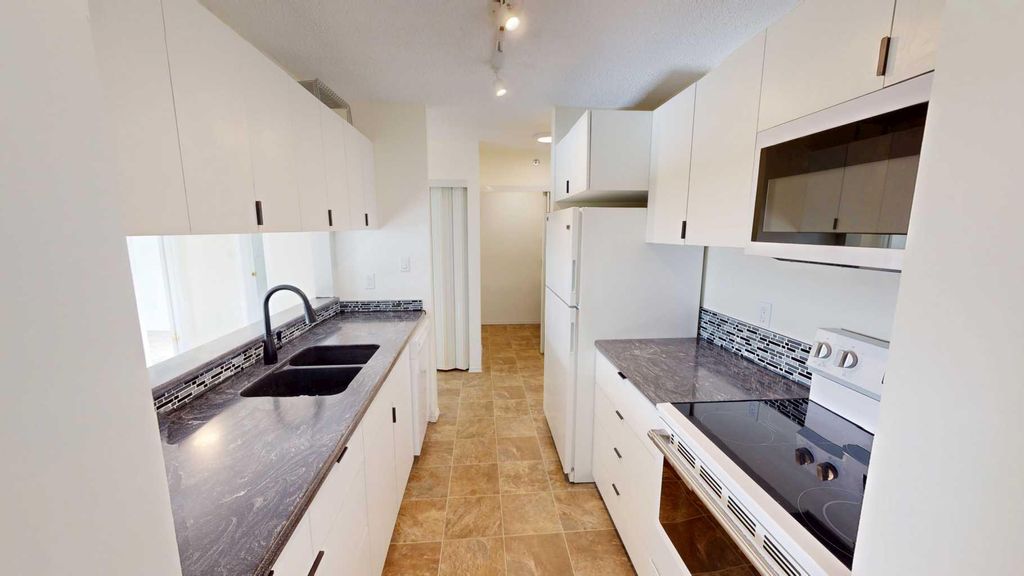 Photo of 10405 99 Street, Grande Prairie, AB T8V 6Z3 (MLS # A2287292)