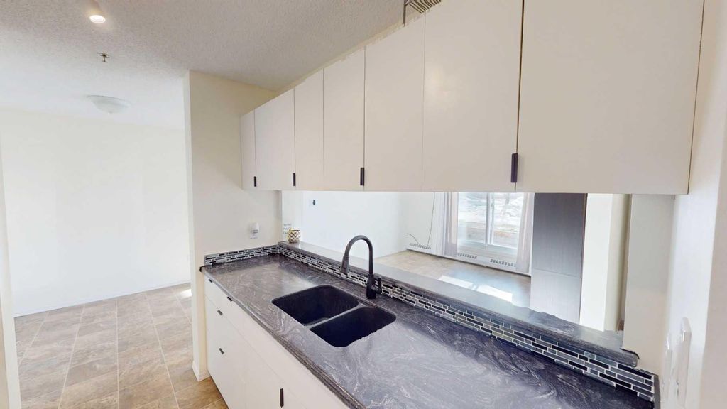 Photo of 10405 99 Street, Grande Prairie, AB T8V 6Z3 (MLS # A2287292)