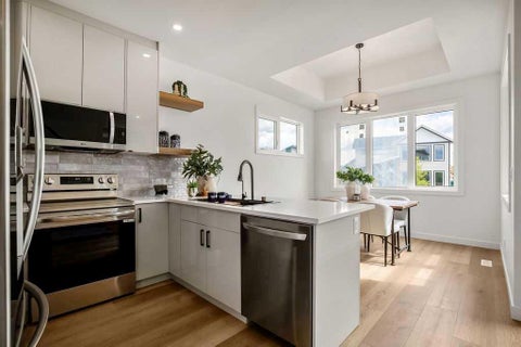 Photo of 642 Cottageclub Bend, Rural Rocky View County, AB T4C 1B1 (MLS # A2329958)