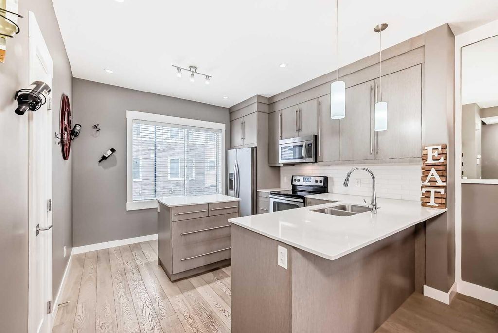 Photo of 111 Rainbow Falls Psge #53, Chestermere, AB T1X 0Z5 (MLS # A2290752)