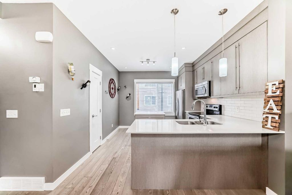 Photo of 111 Rainbow Falls Psge #53, Chestermere, AB T1X 0Z5 (MLS # A2290752)