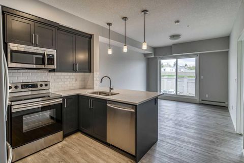 300 Harvest Hills Place NE 215 Calgary AB T3K 2P4