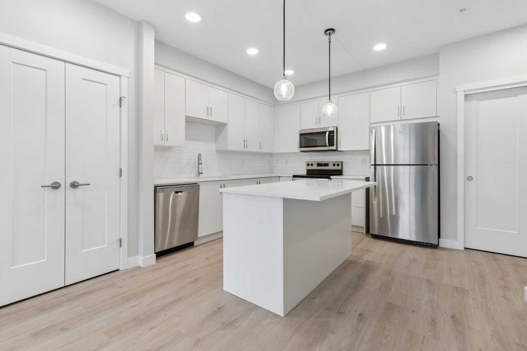 Photo of 655 Shawnee Square SW #312, Calgary, AB T2Y 1E3 (MLS # A2351511)
