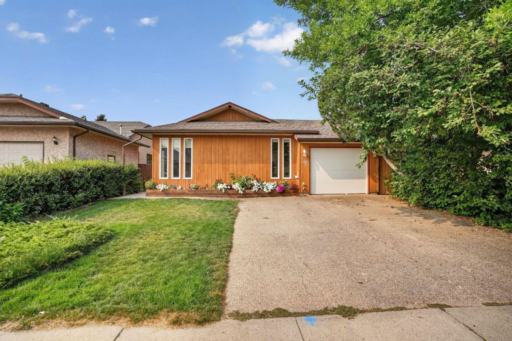 Photo of 47 Wildwood Crescent W, Lethbridge, AB T1K 6C8 (MLS # A2341358)