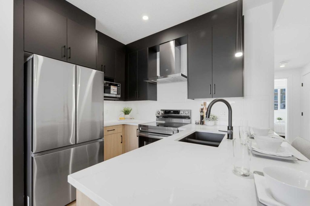 Photo of 200 Belvedere Boulevard SE #409, Calgary, AB T1X 0L5 (MLS # A2303367)