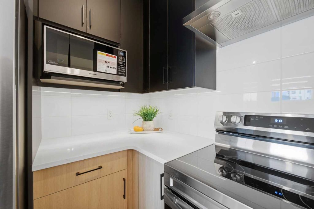 Photo of 200 Belvedere Boulevard SE #409, Calgary, AB T1X 0L5 (MLS # A2303367)