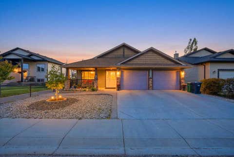 Photo of 203 Hillcrest Boulevard, Strathmore, AB T1P 0A3 (MLS # A2316926)