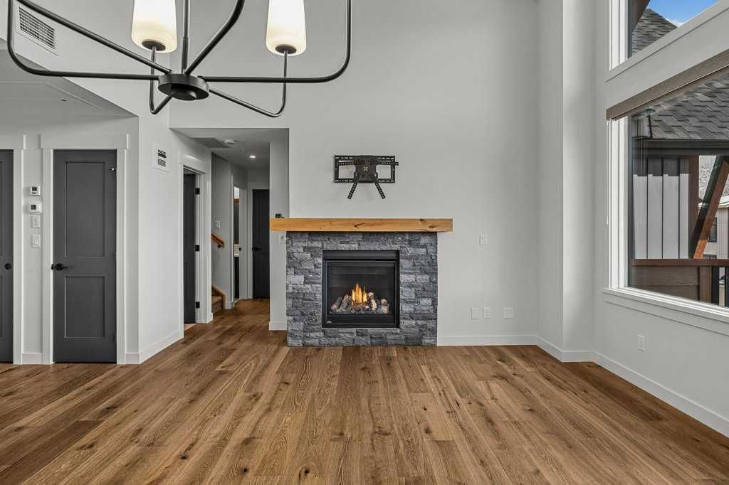 Photo of 1505 Spring Creek Gate #401, Canmore, AB T1W 0N5 (MLS # A2305730)