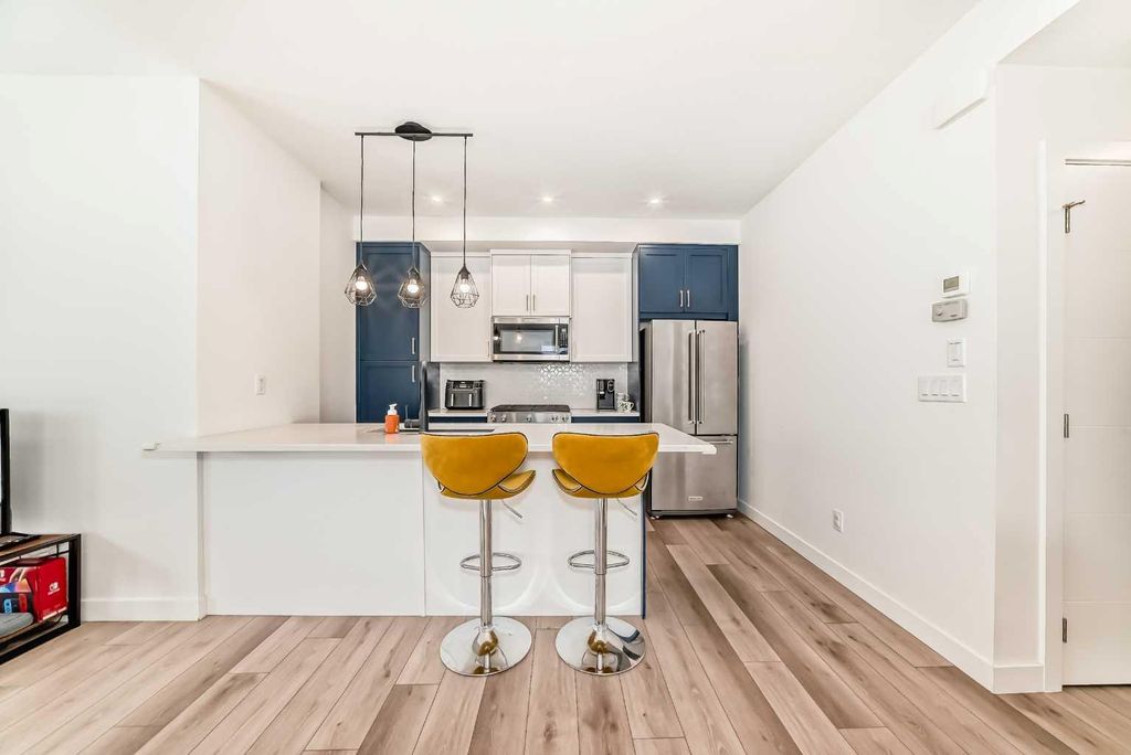 Photo of 44 Spring Creek Common SW, Calgary, AB T2E 6E2 (MLS # A2287438)