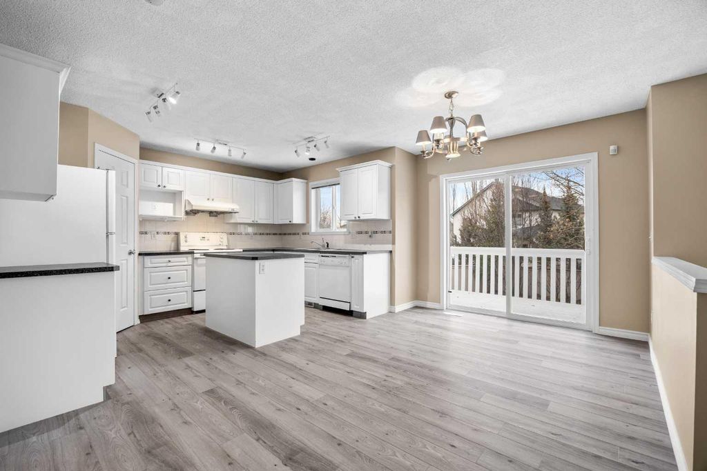 Photo of 635 Panorama Hills Drive NW, Calgary, AB T3K 4V5 (MLS # A2284250)