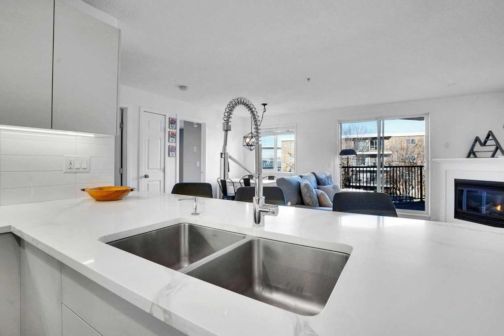 Photo of 1833 11 Avenue SW #203, Calgary, AB T3C 0N7 (MLS # A2285772)