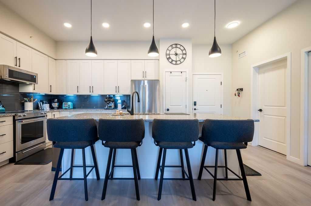 Photo of 20 Mahogany Mews SE #410, Calgary, AB T3M 2W8 (MLS # A2310131)
