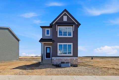 Photo of 67 Huxland Road, Calgary, AB T2A 6Z7 (MLS # A2318872)