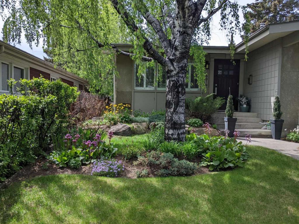 Photo of 6019 Lakeview Drive SW, Calgary, AB T3E 5S9 (MLS # A2293017)