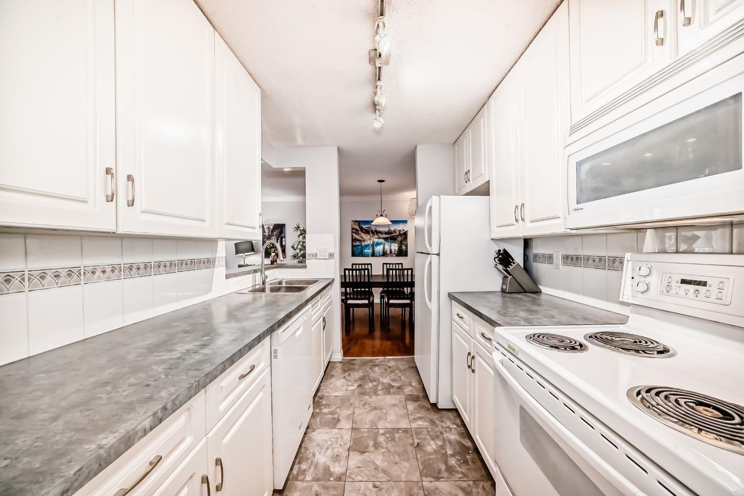 727 56 Avenue SW 215