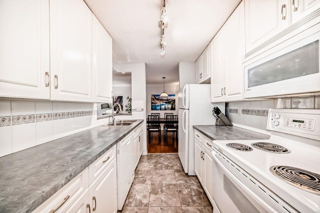 Photo of 727 56 Avenue SW #215, Calgary, AB T2V 4Z8 (MLS # A2286796)