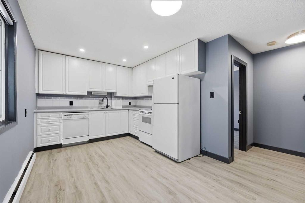 Photo of 3103 Blakiston Drive NW #203, Calgary, AB T2L 1L7 (MLS # A2300854)