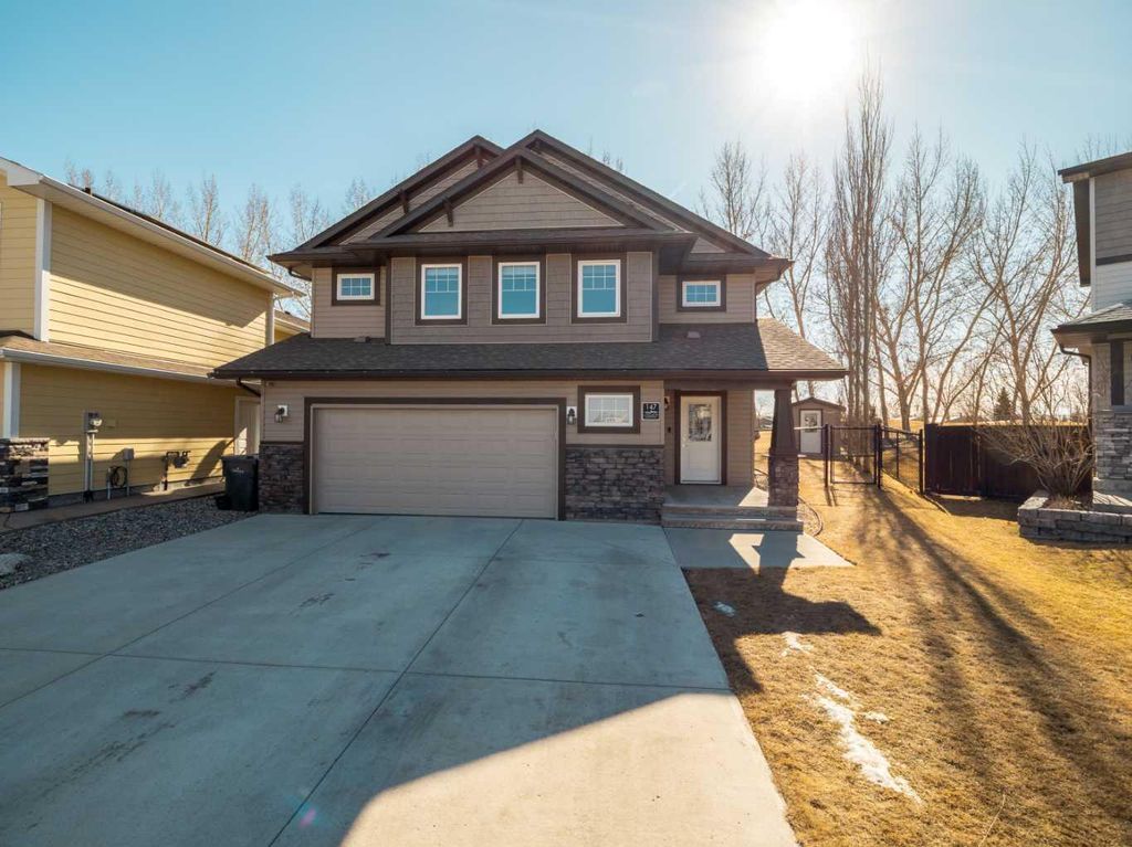 Photo of 147 Westgate Drive, Coaldale, AB T1M 0E1 (MLS # A2291001)