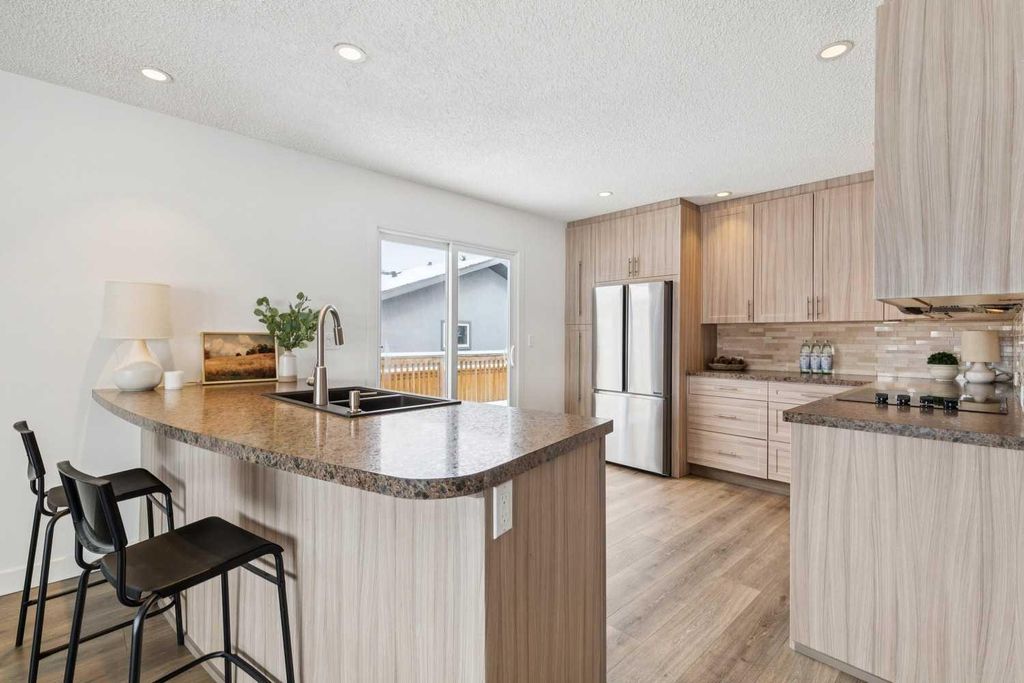 Photo of 11016 Braton Place SW, Calgary, AB T2W 1B3 (MLS # A2292154)