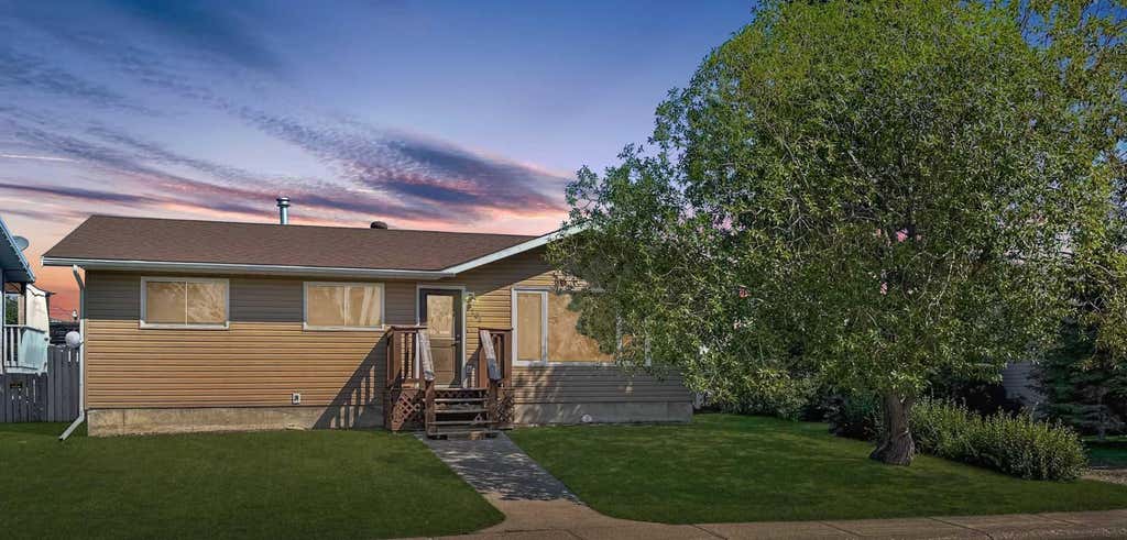Photo of 204 10 Avenue NE, Sundre, AB T0M 1X0 (MLS # A2338115)