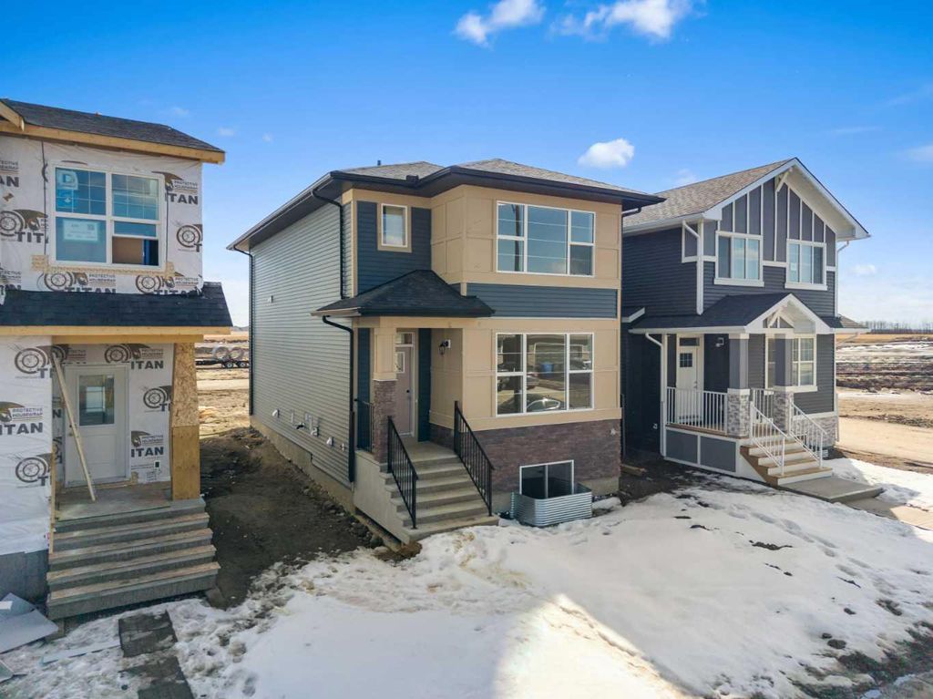 Photo of 659 Chelsea Pier Run, Chestermere, AB T1X 3H6 (MLS # A2301086)