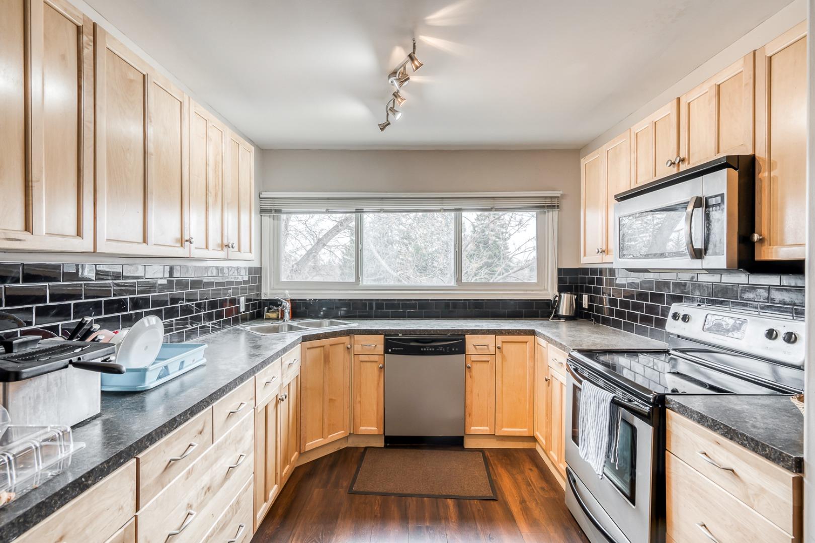 8231 Elbow Drive SW 210