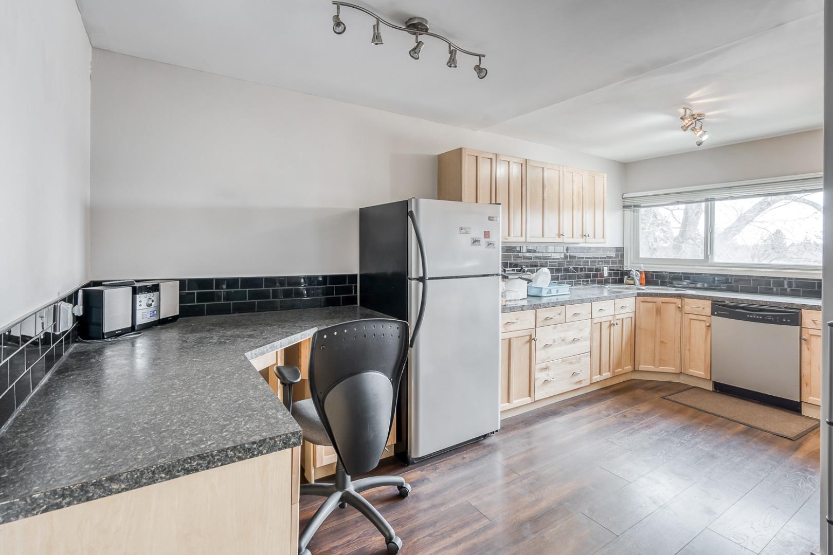 8231 Elbow Drive SW 210