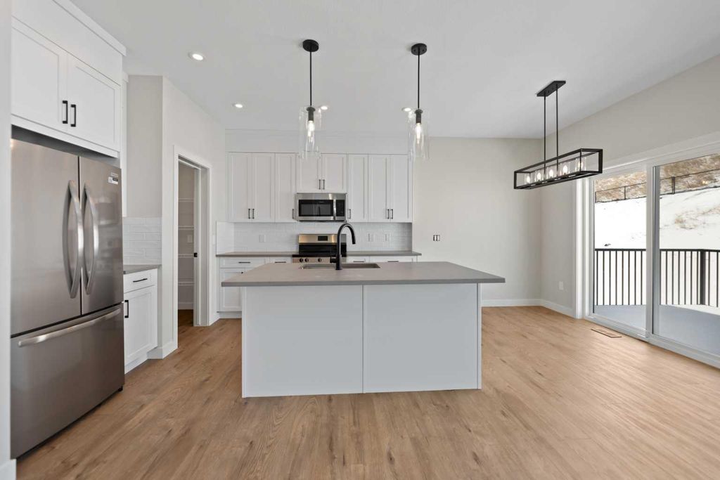 Photo of 1051 Fowler Road SW, Airdrie, AB T4B 5T2 (MLS # A2293504)