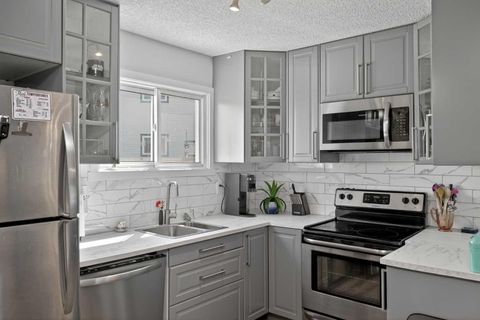 Photo of 131 Templehill Drive NE #47, Calgary, AB T1Y 4T1 (MLS # A2311771)