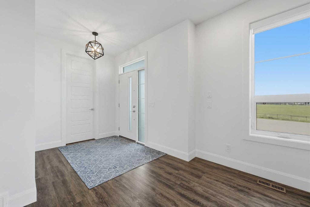 Photo of 125 South Harmony Drive, Rural Rocky View County, AB T3Z 0C5 (MLS # A2347861)