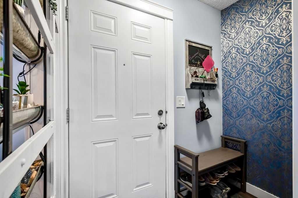 Photo of 51 Big Hill Way SE #4, Airdrie, AB T4A 1M7 (MLS # A2286365)