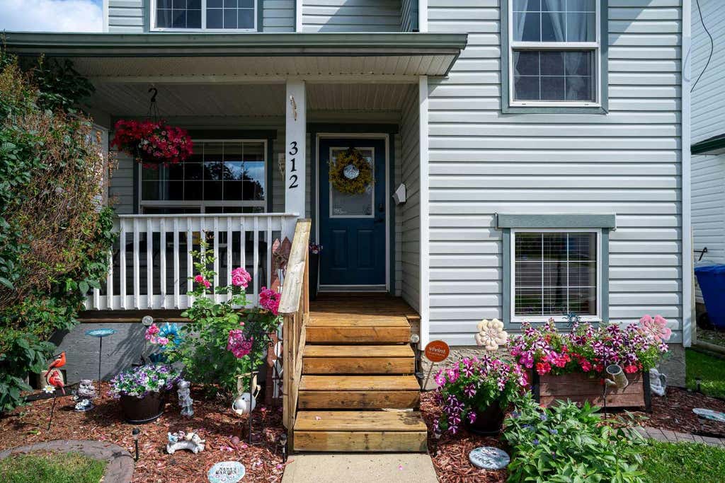 Photo of 312 Diefenbaker Drive, Fort McMurray, AB T9K 2K1 (MLS # A2337660)