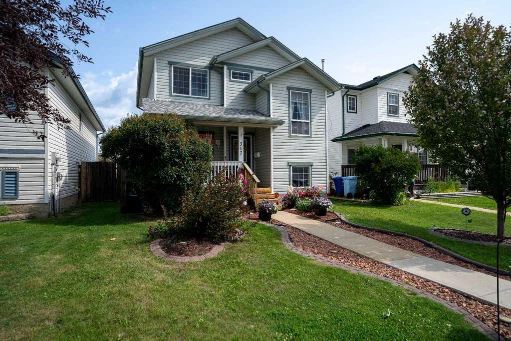 Photo of 312 Diefenbaker Drive, Fort McMurray, AB T9K 2K1 (MLS # A2337660)
