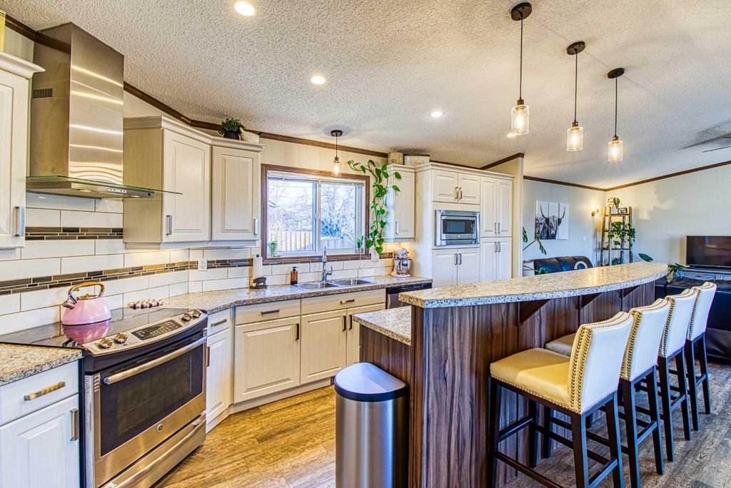 Photo of 1004 6th Avenue, Beaverlodge, AB T0H 0C0 (MLS # A2304006)