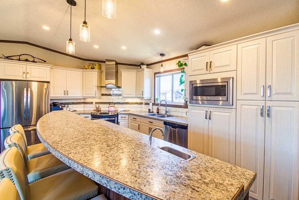 Photo of 1004 6th Avenue, Beaverlodge, AB T0H 0C0 (MLS # A2304006)