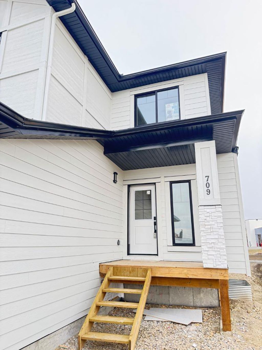 Photo of 709 Mandalay Avenue, Carstairs, AB T0M 0N0 (MLS # A2265417)