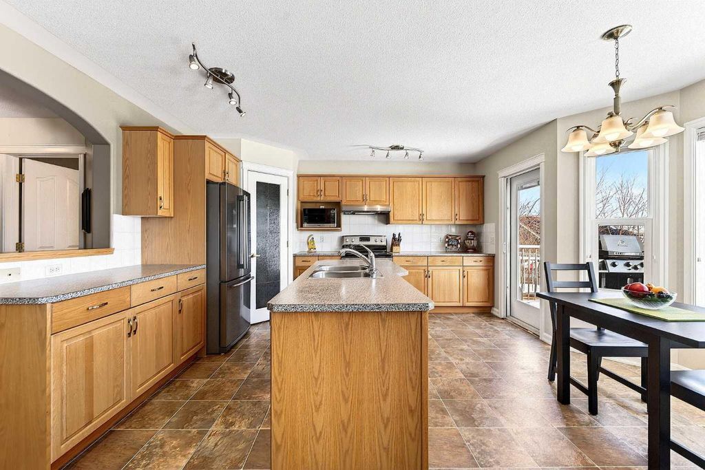 Photo of 219 Hidden Ranch Circle NW, Calgary, AB T3A 5R1 (MLS # A2299598)