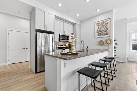 Photo of 255 Les Jardins Park SE #101, Calgary, AB T2C 5V3 (MLS # A2330390)