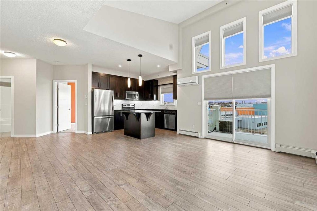 Photo of 402 Marquis Lane SE #420, Calgary, AB T3M 2G7 (MLS # A2355706)