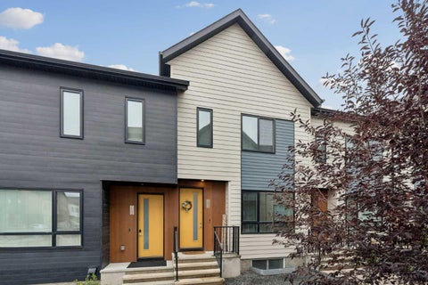 Photo of 704 Redstone Crescent NE, Calgary, AB T3N 1M3 (MLS # A2345602)