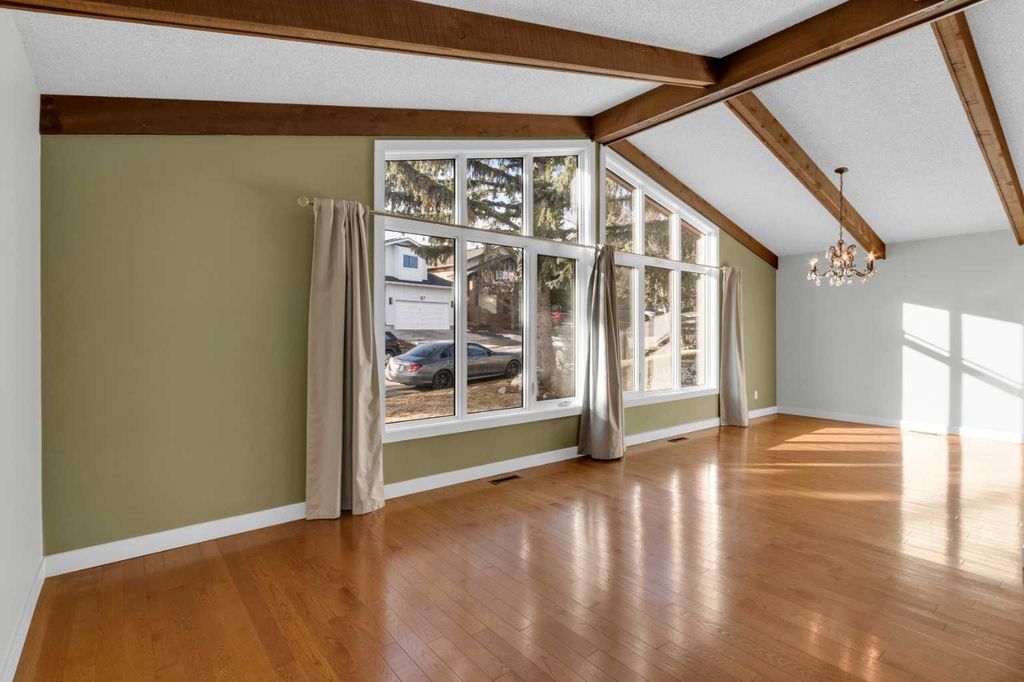 Photo of 15 Beaconsfield Place NW, Calgary, AB T3K 1W8 (MLS # A2294456)