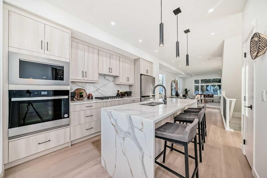 Photo of 3404 8 Avenue SW #1, Calgary, AB T3C 2Z7 (MLS # A2313022)