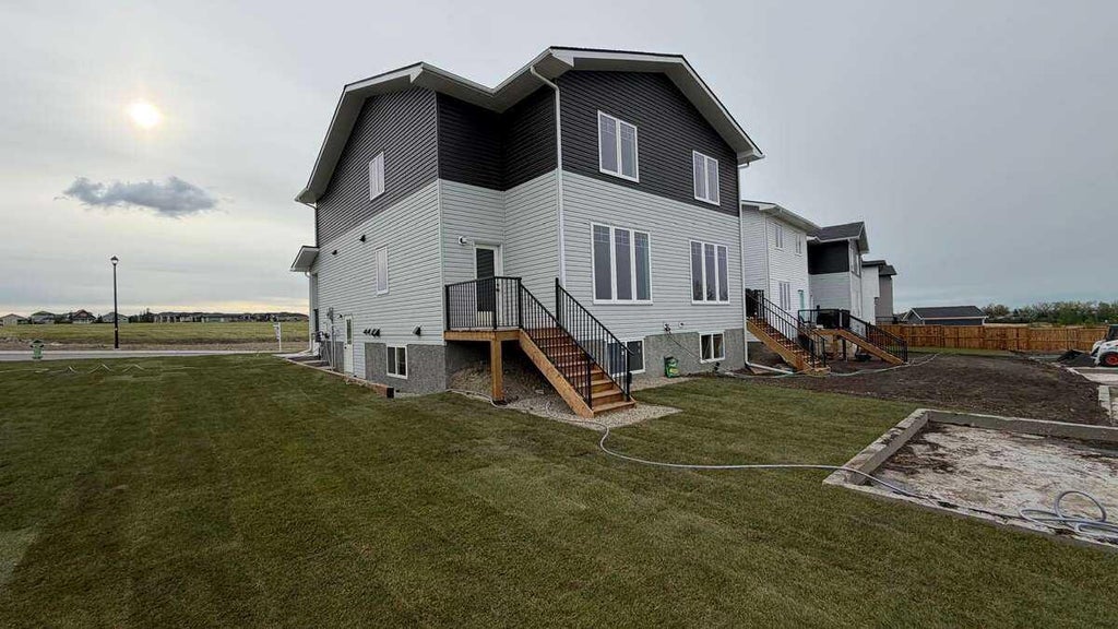 Photo of 1903 Mccaskill Drive, Crossfield, AB T0M 0S0 (MLS # A2351734)